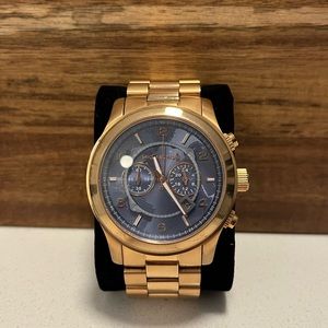 Michael Kors oversized rose gold stop hunger watch